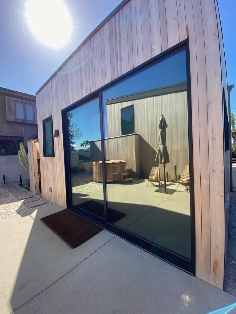 Cedar-clad beach home with a floor-to-ceiling slider, Coronado