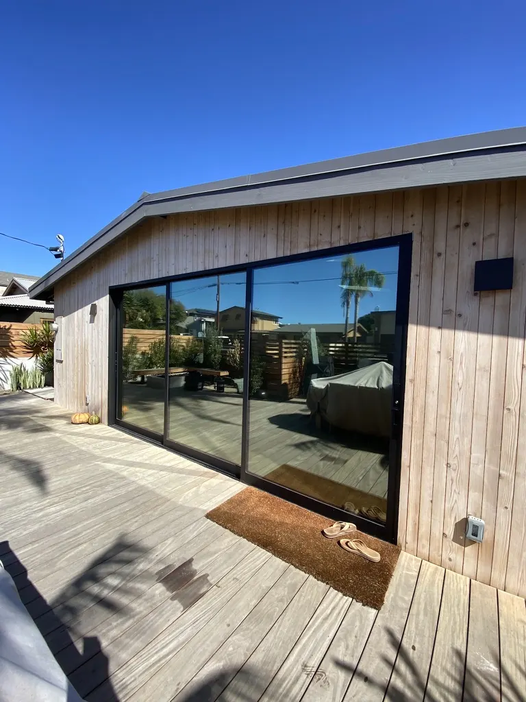 Coronado beach home with reflective window film on a large deck slider
