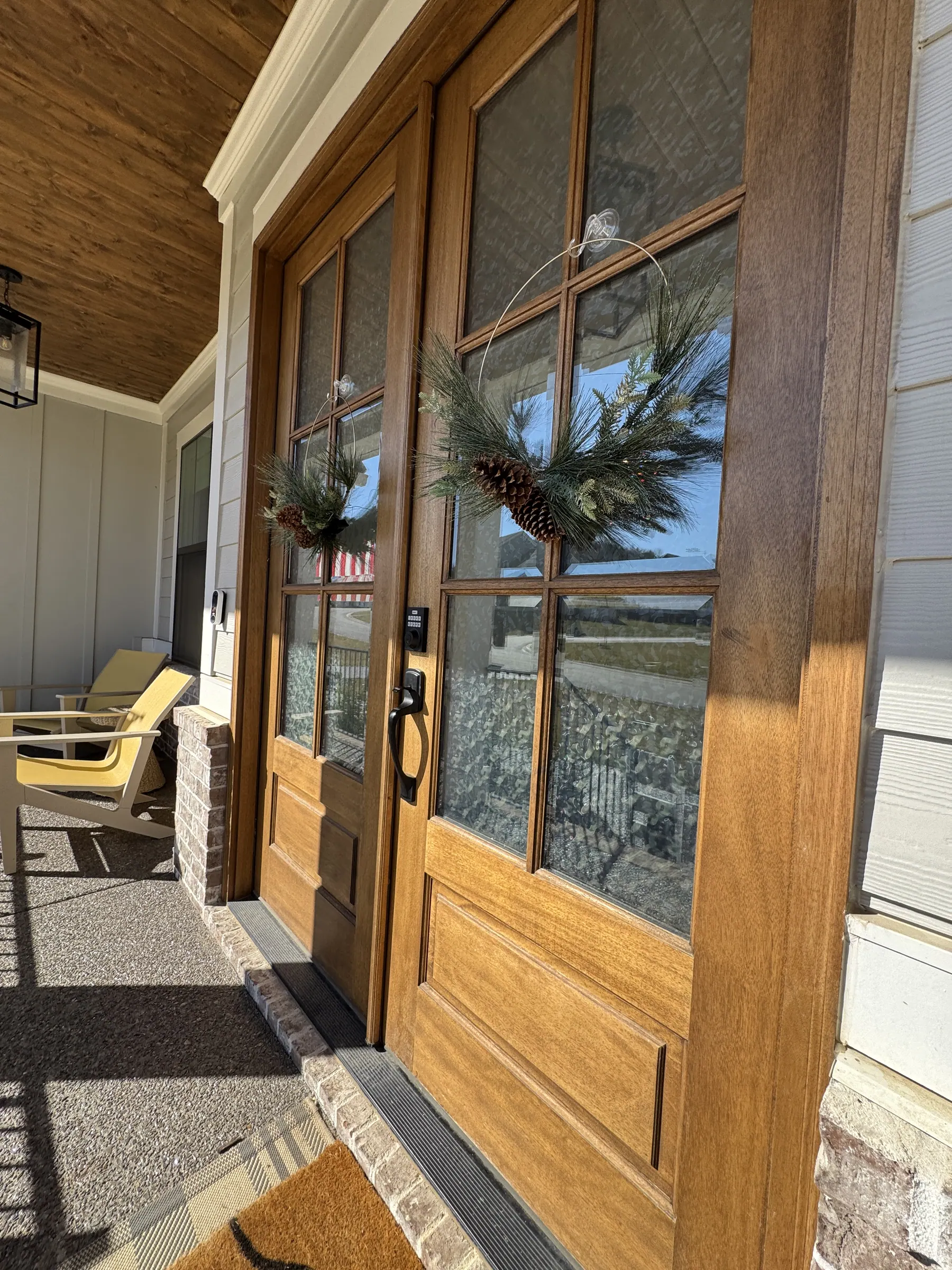 Entry doors, textured film from outside