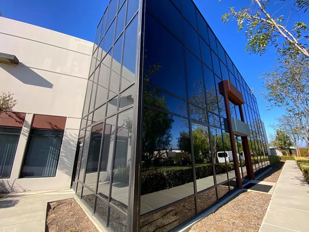 Office building with reflective commercial window film installed by Tint Solutions