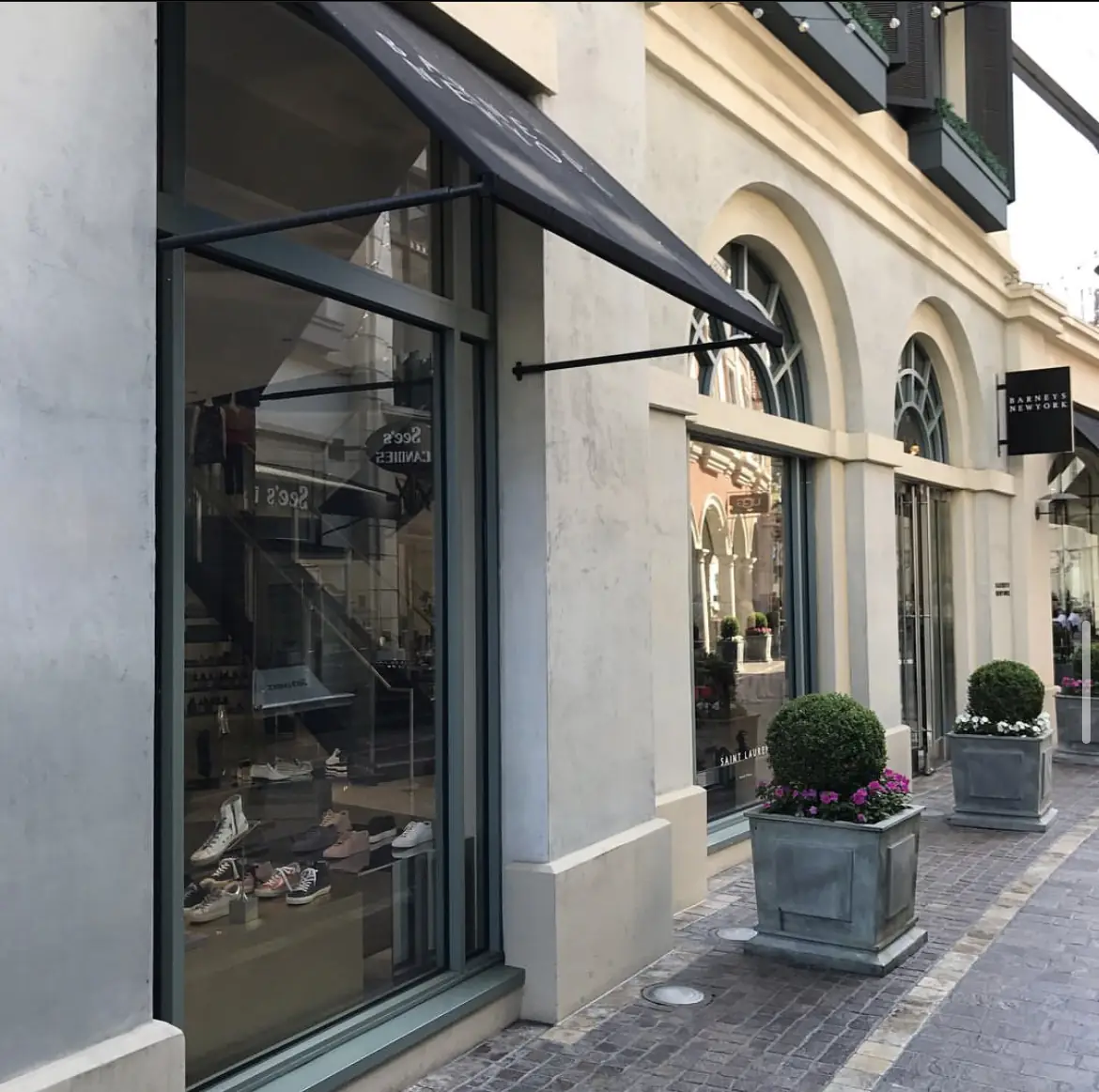 Arched storefront entry with security film