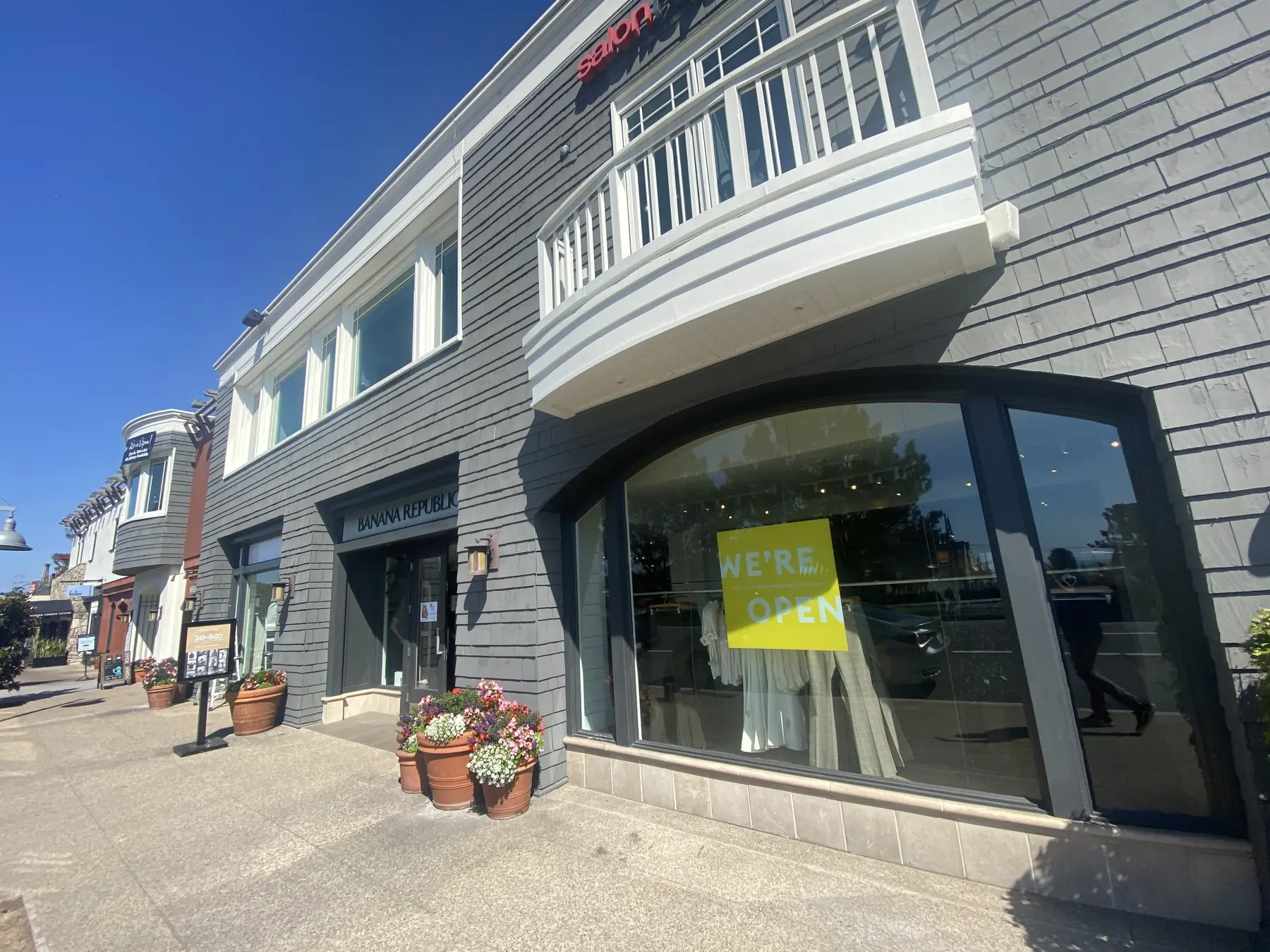 Curved bay storefront window with security film