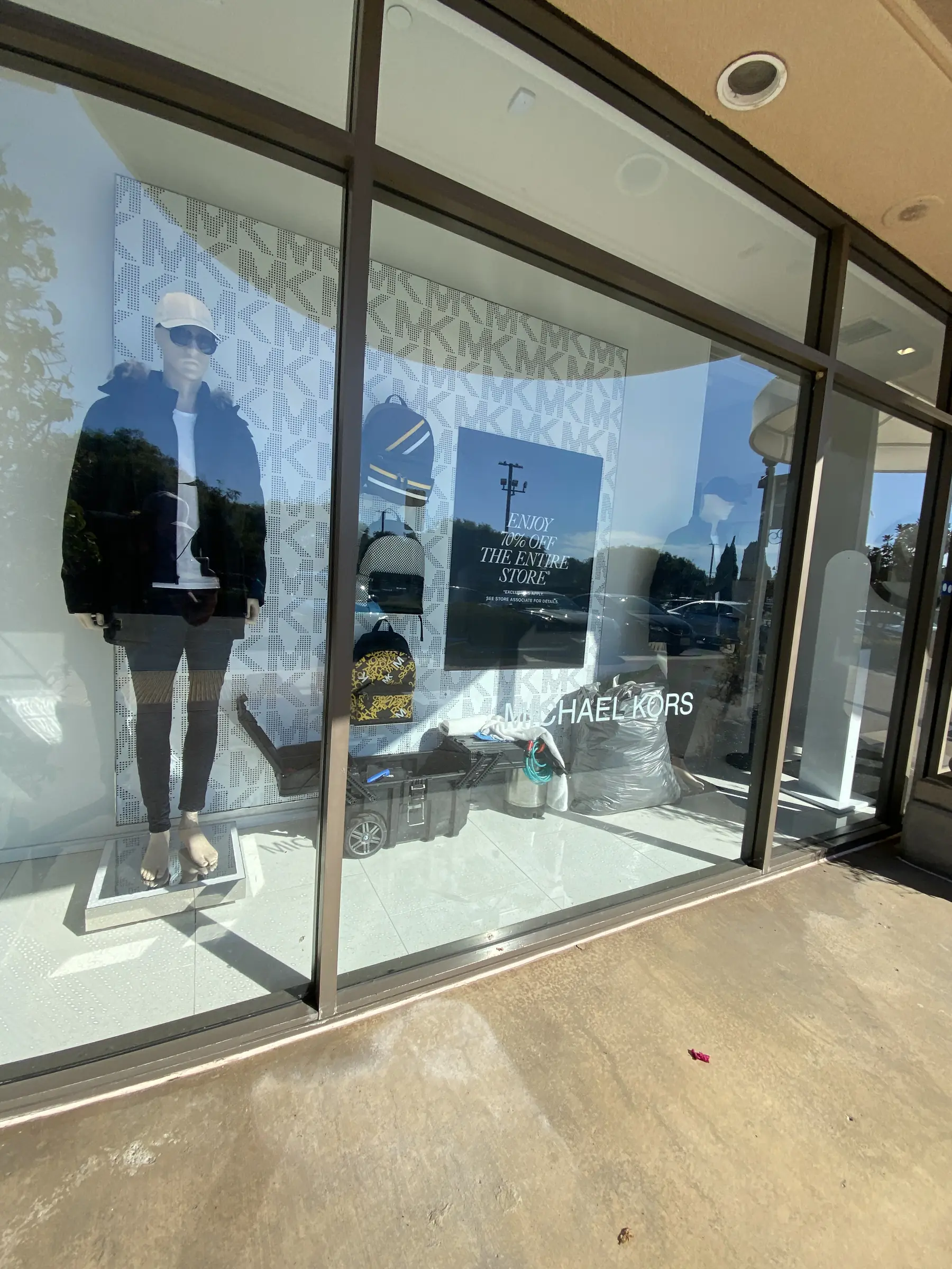 Full-height retail window with security film