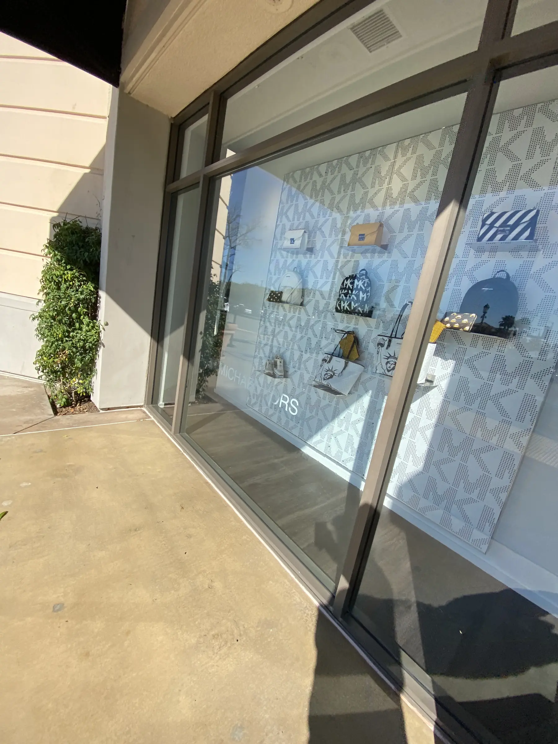Retail window at an angle showing protective film