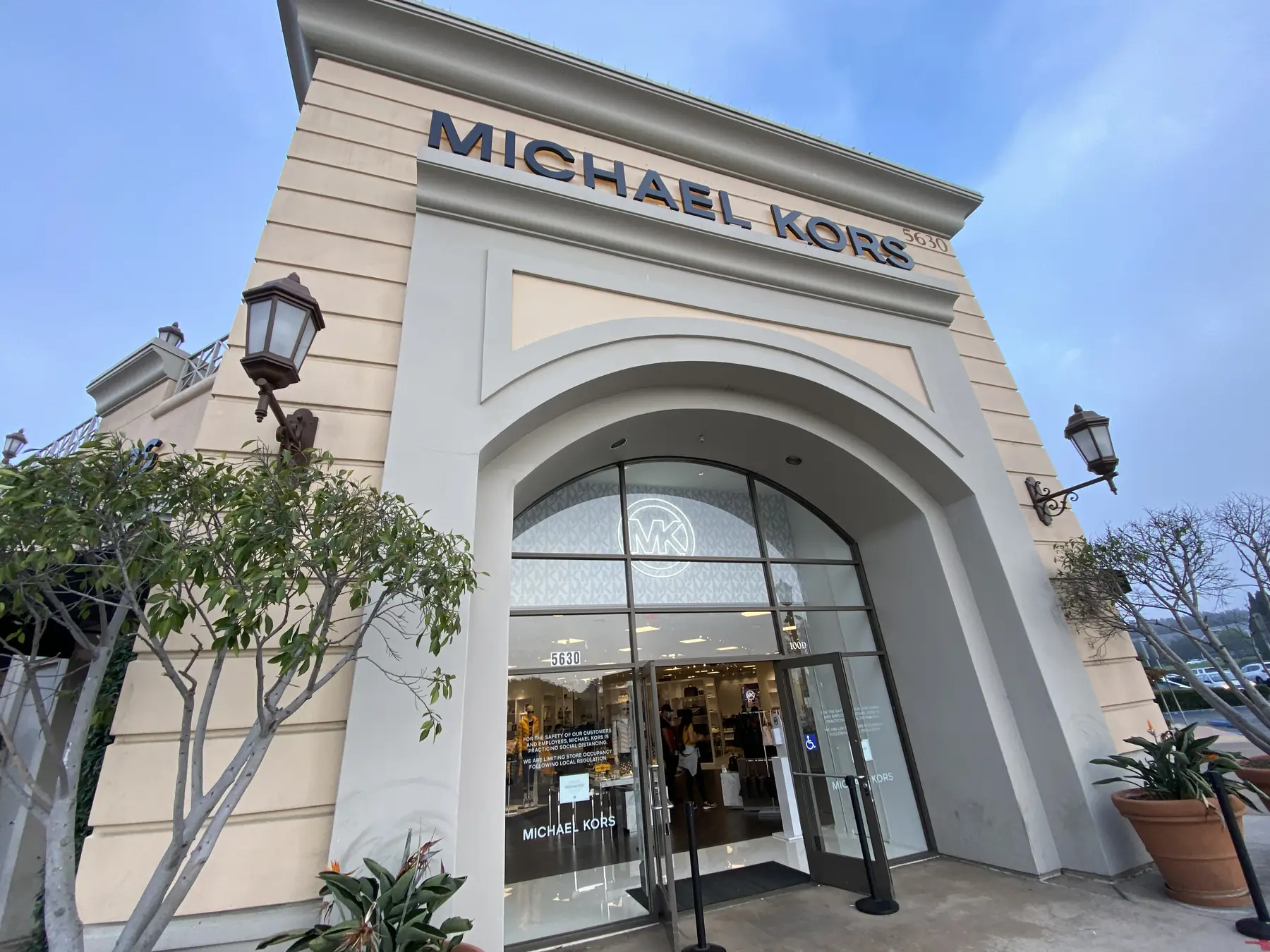 Retail flagship entrance with security film on the storefront glass