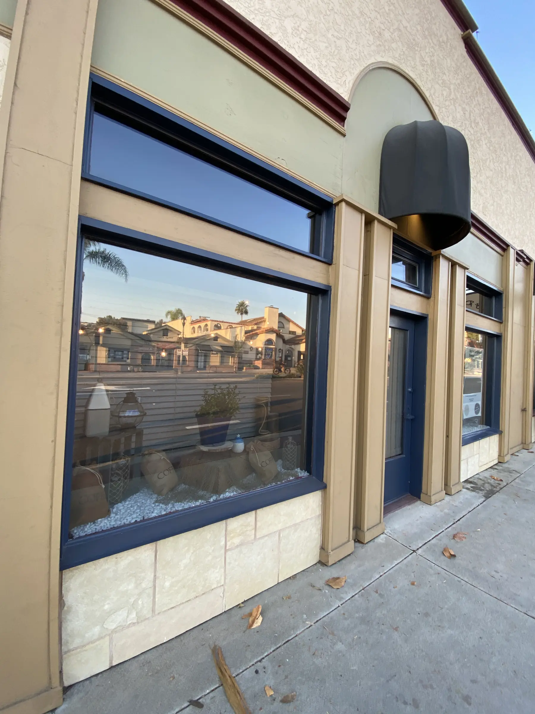 Street storefront windows with protective film