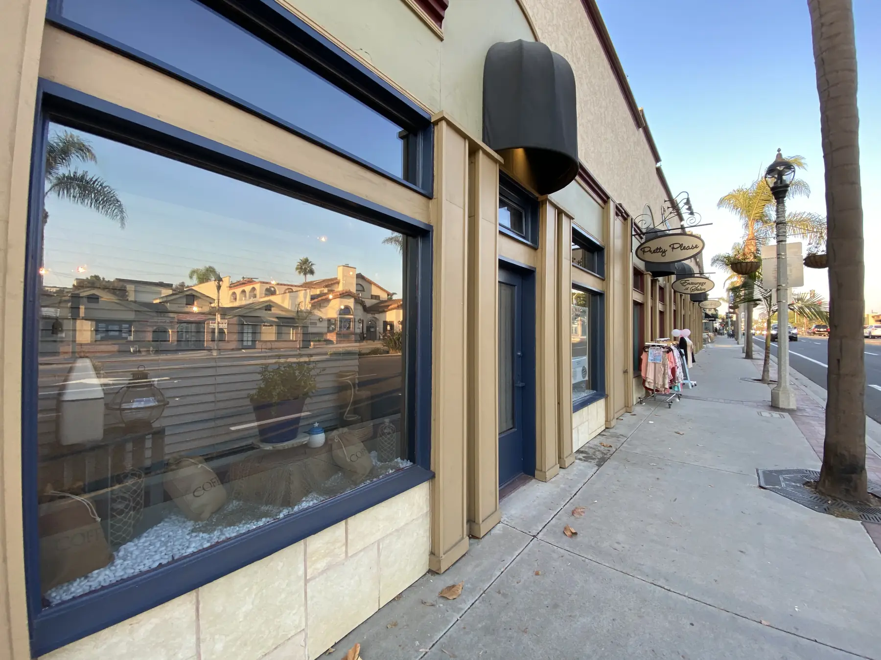 Street-level storefront windows with protective film
