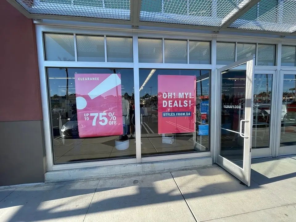 Outlet storefront with protective film on the lower panes