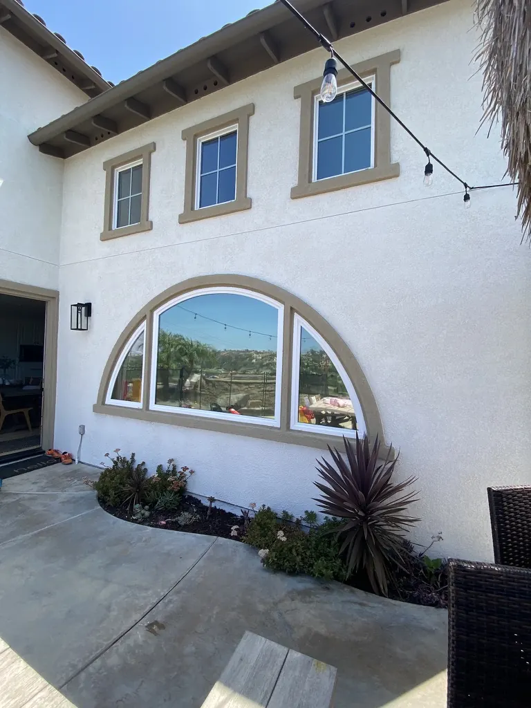 Arched window on a Temecula-area home with DR OptiTune window film