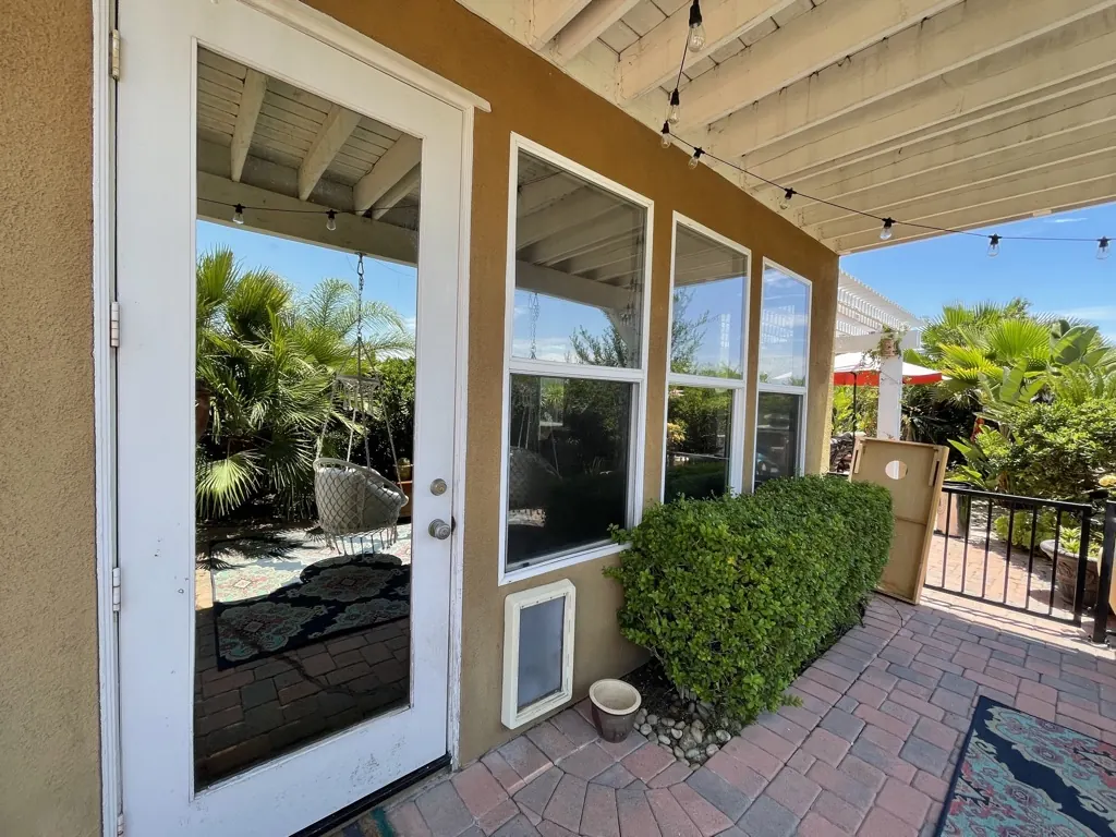 Patio door and windows under a pergola, Temecula area