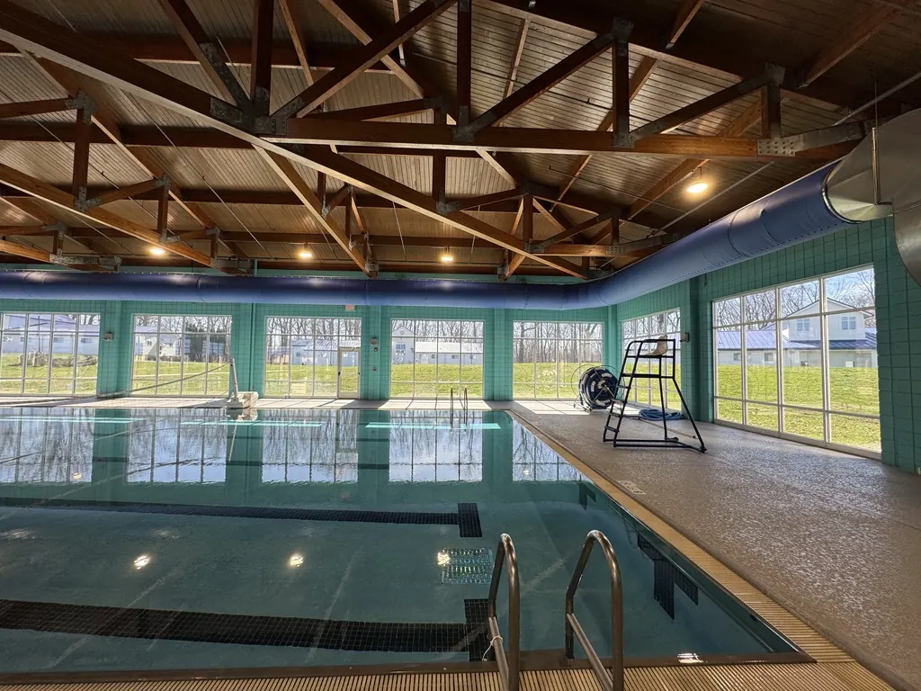 Indoor pool with window film on the surrounding window walls