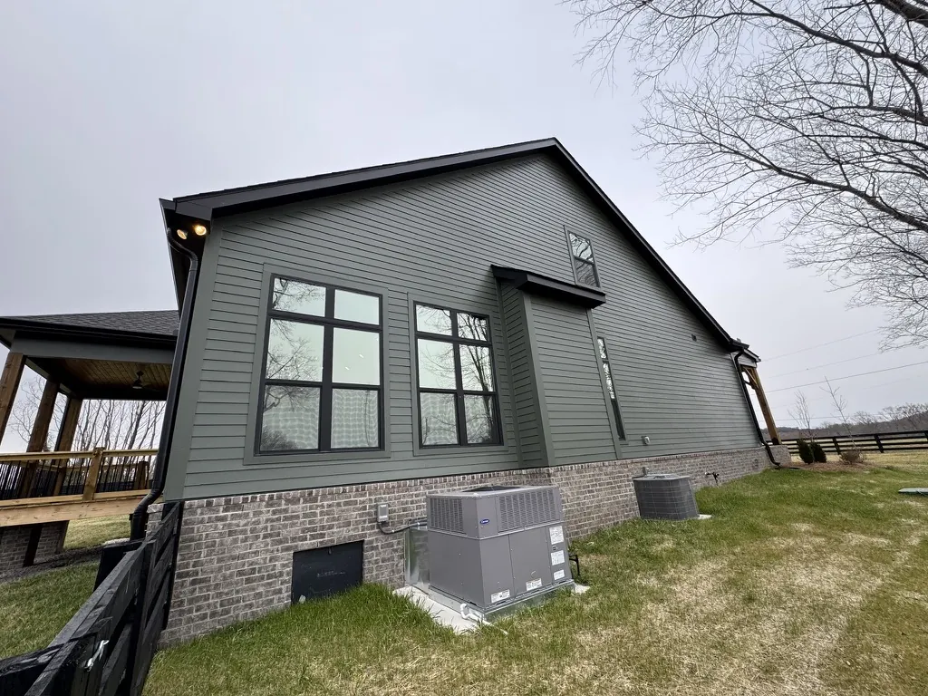 Side elevation with tall windows and a gable window, Middle Tennessee home